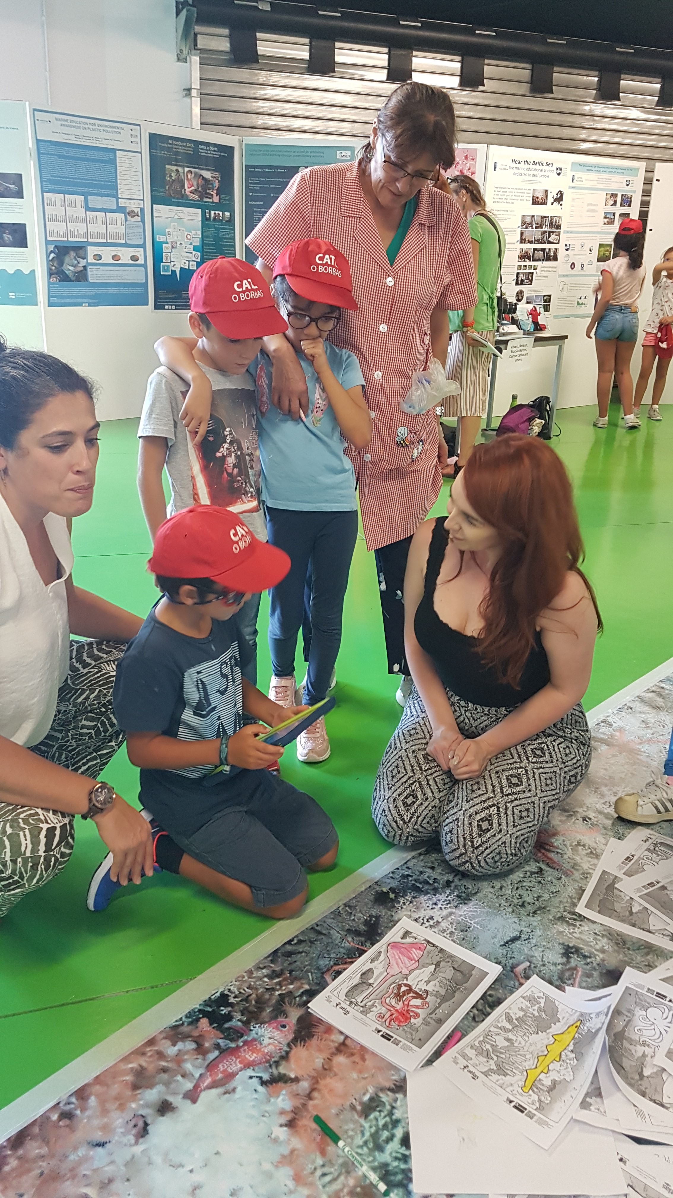 Children from a local school in São Miguel exploring AR colouring activity and learning about deep-sea animals with ATLAS Project Officer Natalie Walls. (c) Natalie Walls